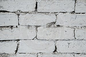 The wall is made of old light bricks. Brick white background.