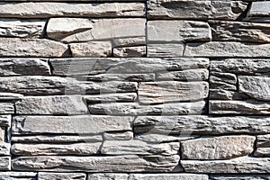 Wall made of old natural gray stone