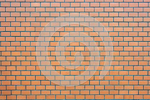 Wall made of orange bricks
