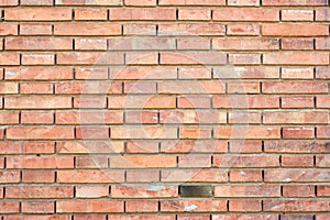 Wall made of orange clinker bricks