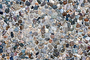 Wall made of small colorful sea stones