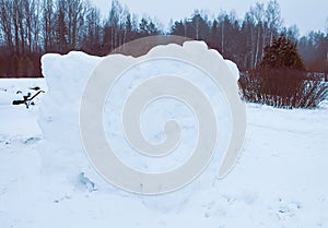 Wall made of snow on rural field