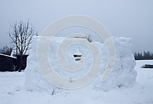 Wall made of snow on rural field