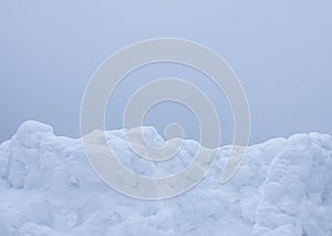 Wall made of snow on rural field