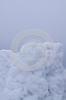 Wall made of snow on rural field