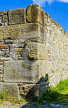 Wall made of stone or brick in the archaeological ruins