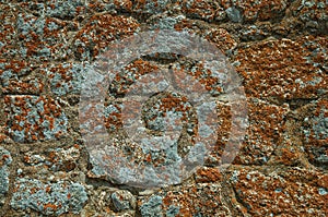 Wall made of stones forming a singular background in Monsanto