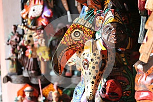 Wall of Masks for Sale in the Market in Antigua Guatemala photo