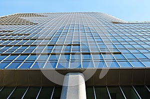 Wall of modern office building from glass and metal.