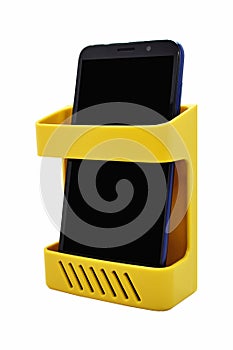 Wall mounted plastic organizer with mobile in it