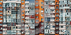 Wall Of Multistory Residential Building With Many Windows, front view texture background