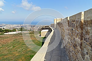 Wall in Naryn-Kala fortress and view of Derbent city.