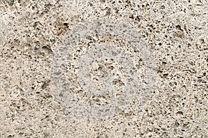 A wall from natural stone travertine
