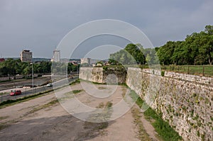 Wall of Nis Fortress and Nisava river embankment. NiÅ¡