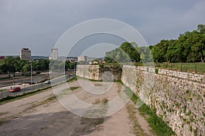 Wall of Nis Fortress and Nisava river embankment. NiÃÂ¡ photo