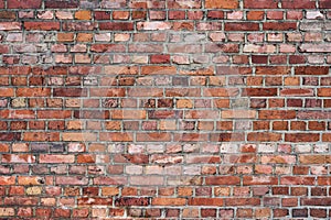 Wall of an old building built of red bricks