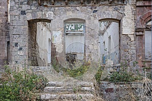 The wall of the old collapsed building