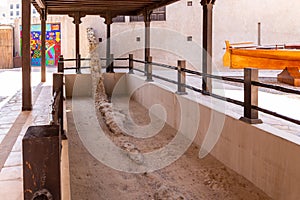 Wall of Old Dubai - old coral stone defense city wall remains in Al Fahidi Historical District, Dubai, UAE