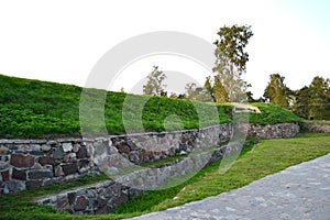 Wall of old Korela fortress at evening