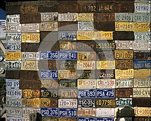 Wall of old license plates