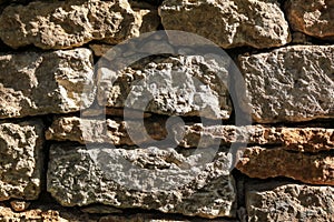 Wall of old stone bricks as an abstract background.