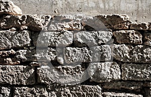 Wall of old stone bricks as an abstract background.