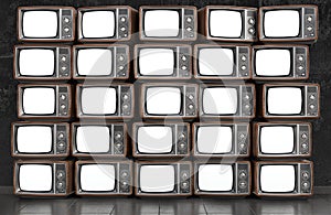 Wall of old TVs with white screen