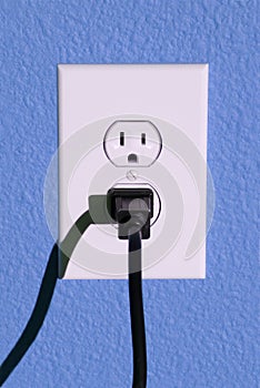 Wall outlet and plug