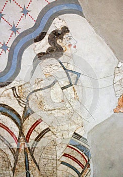 Wall painting of the House of the Ladies depicting a woman from Akrotiri Minoan Settlement, Greece photo