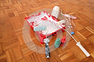 Wall painting equipment and tools. Section of painting tools which include bucket with white paint color, red and green bottle.