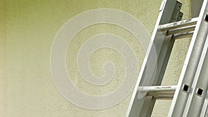 wall painting.Home renovation outside.Construction and renovation concept. Roller painting the walls of the house in