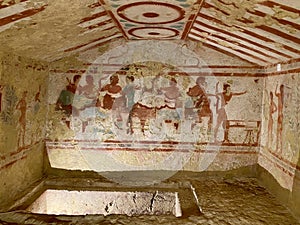 Wall paintings of the blue demon in ancient Etruscan tombs