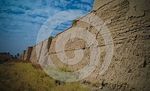 Wall of partially restored Babylon ruins at Hillah, Iraq photo