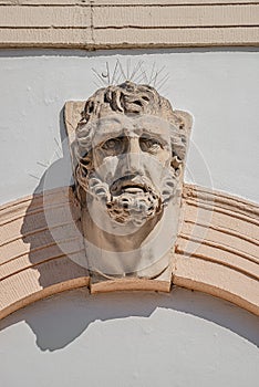 Wall portrait sculpture of Roman Nobleman at city hall in downtown of Magdeburg, Germany, closeup, details