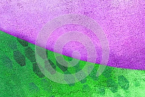 Wall with purple and green paint pattern paint