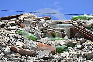 A wall repaired with salvaged materials