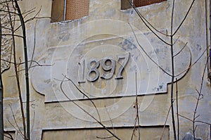 Wall with sign of year 1897