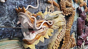 On the wall of the statue landscape, carved dragon lifelike