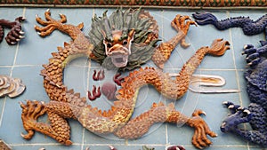 On the wall of the statue landscape, carved dragon lifelike