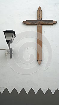 wall street lamp and a wooden cross, Las Palmas, Canary islands