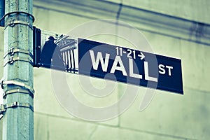 Wall Street road sign corner of NY Stock Exchange