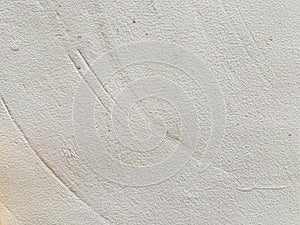 A wall surface texture with an orange peel accent.