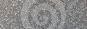 Wall surface with white splashes. For use as an abstract background. Panorama