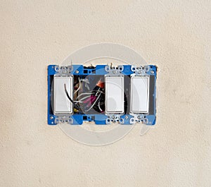 Wall switch being repaired with rocker style