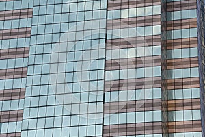 Wall of tall building or glass of skyscraper background.