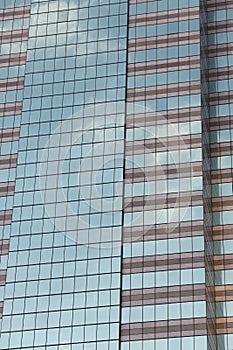 Wall of tall building or glass of skyscraper background.