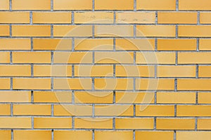 Wall texture made of yellow bricks