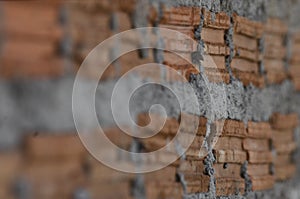 Wall texture red Background of new brick wall deep view in construction site