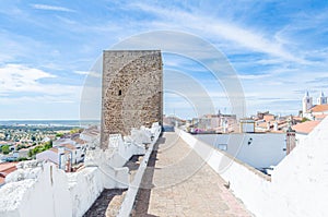 wall and tower in Avis, picturesque medieval village, in the Alentejo region. Portugal photo