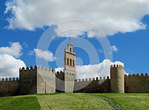 Wall, tower and bastion of Avila, Spain, made of yellow stone bricks